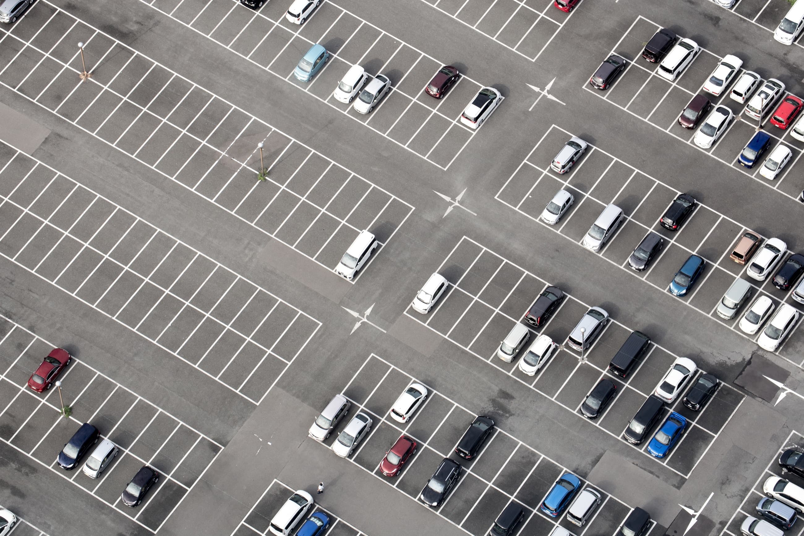 Aerial view of an organized commercial parking lot
